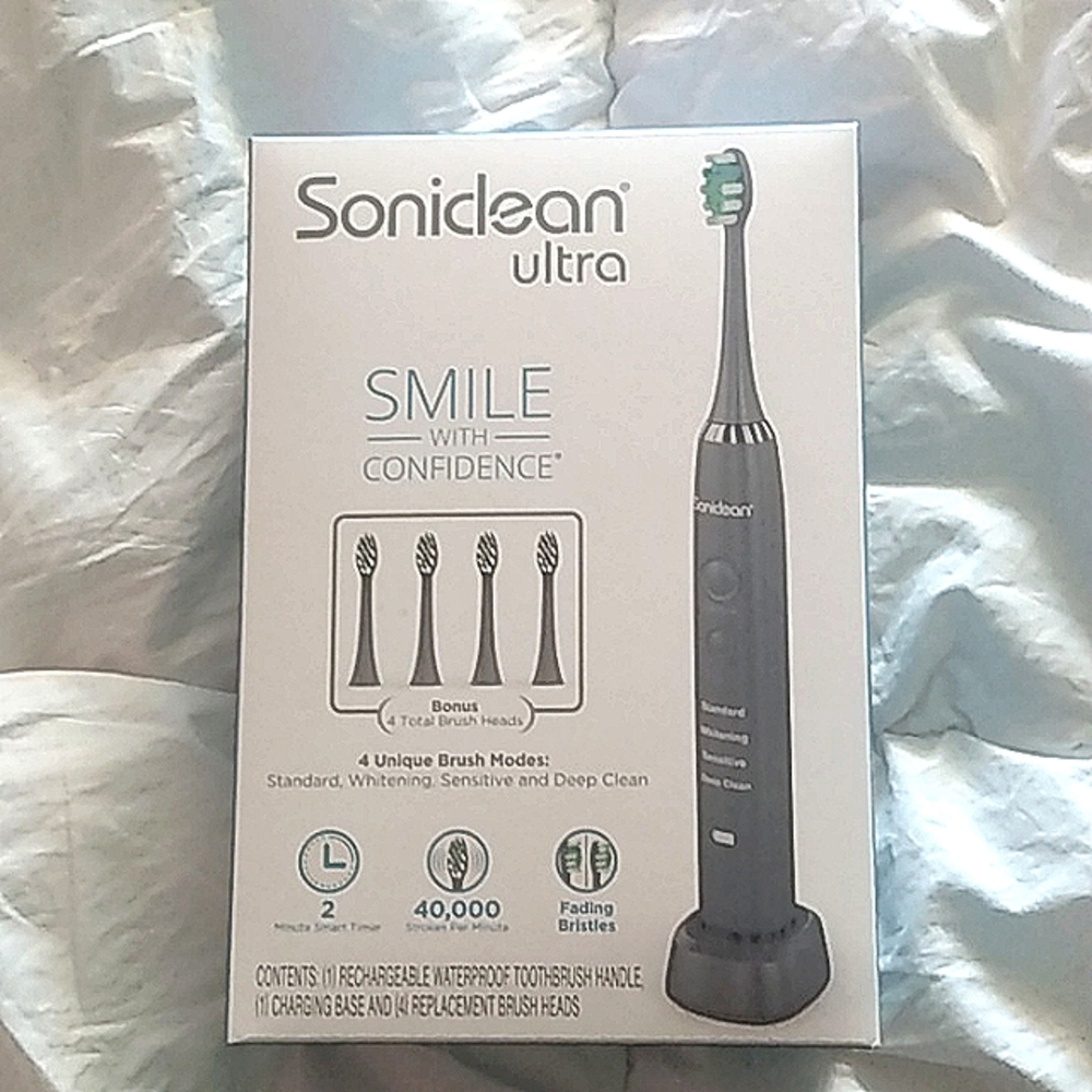 Soniclean ultra rechargeable waterproof toothbrush with 4 Bonus heads